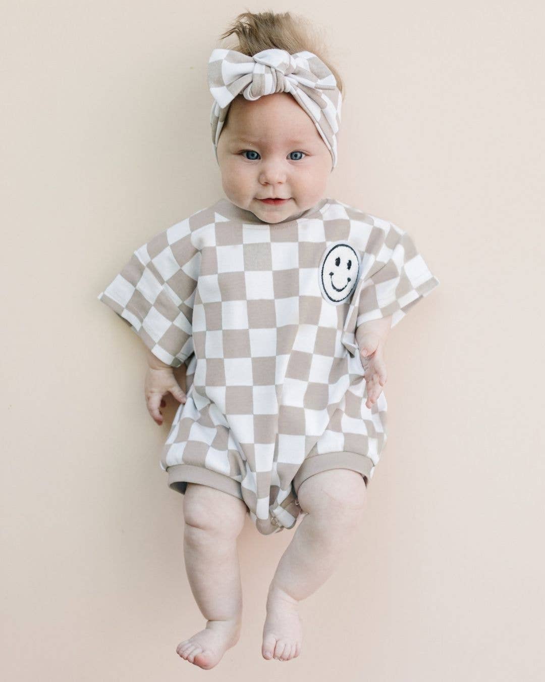 Short Sleeve Bubble Romper | Checkered Smiley Latte: BOW SOLD SEPARATE