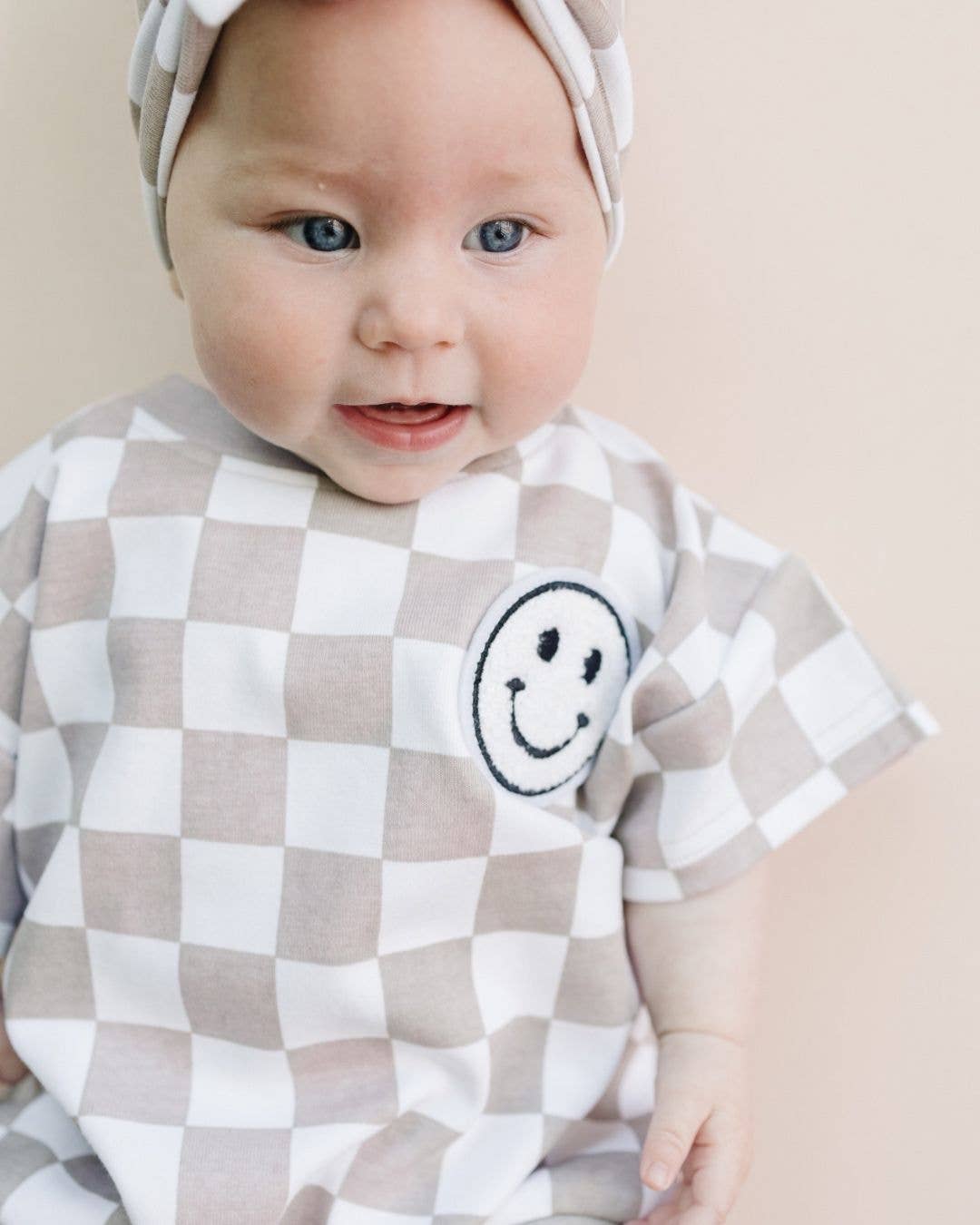 Short Sleeve Bubble Romper | Checkered Smiley Latte: BOW SOLD SEPARATE
